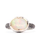 Ring with central opal and black diamonds
